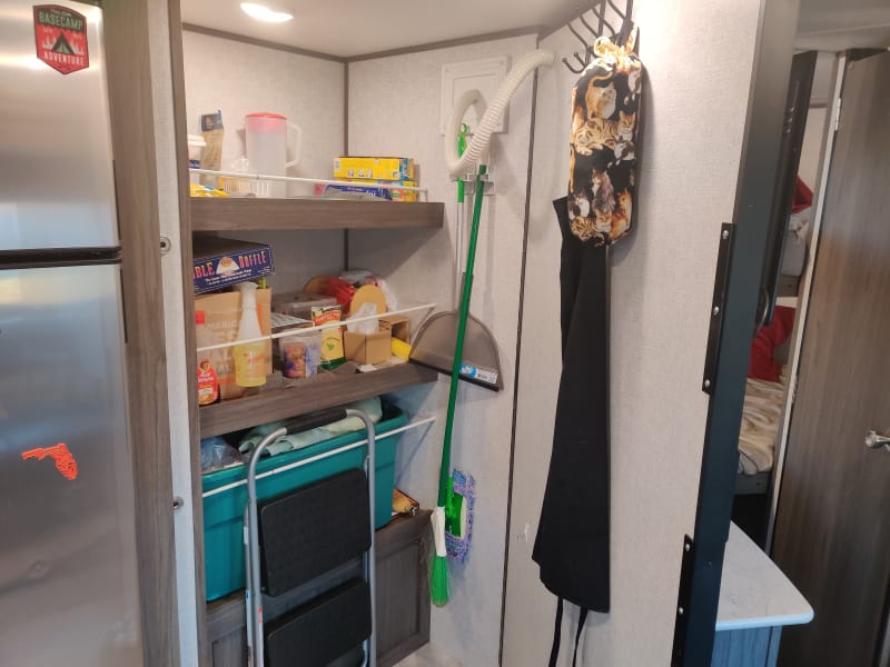 Open pantry, lot's of storage for dry goods, games, etc.