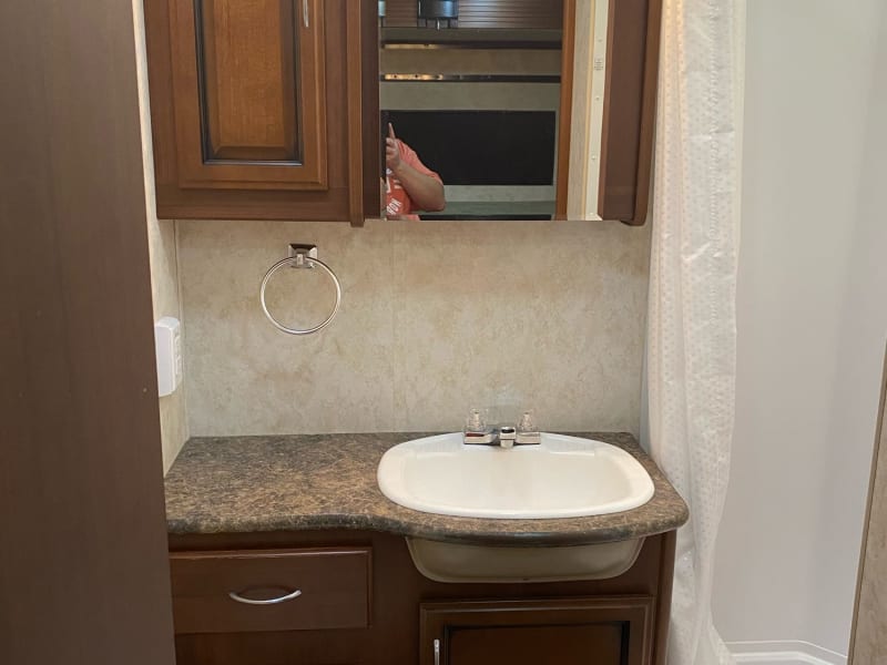 Bathroom with Sink & Storage. 