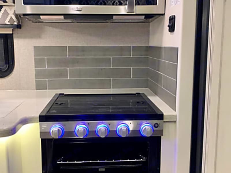 Full kitchen- 3 burner stovetop and oven.