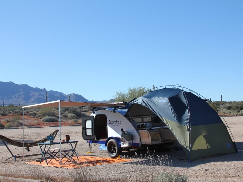 Teardrop Travel Trailer with Sideroads Awning Deployed. Along with ARB Awning and Hammock Stand.