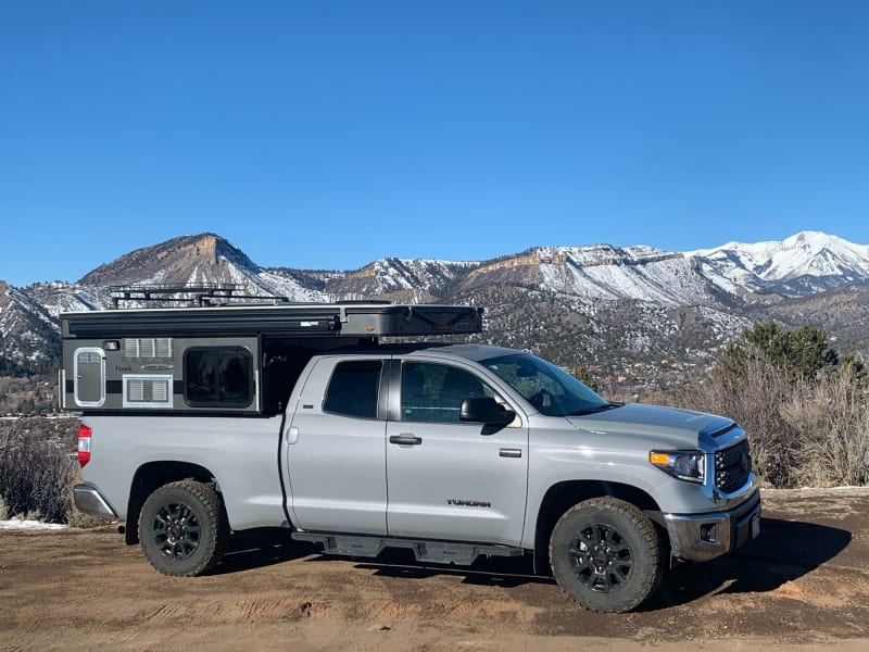 Truck with camper closed, low profile 