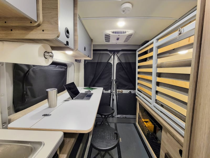 With the murphy bed up, the bedroom converts to a spacious work/play/eat area in seconds