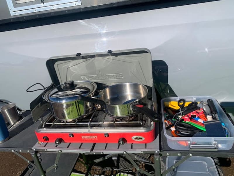 2 burner stove, pots, pans, table and all the cooking utensils you need