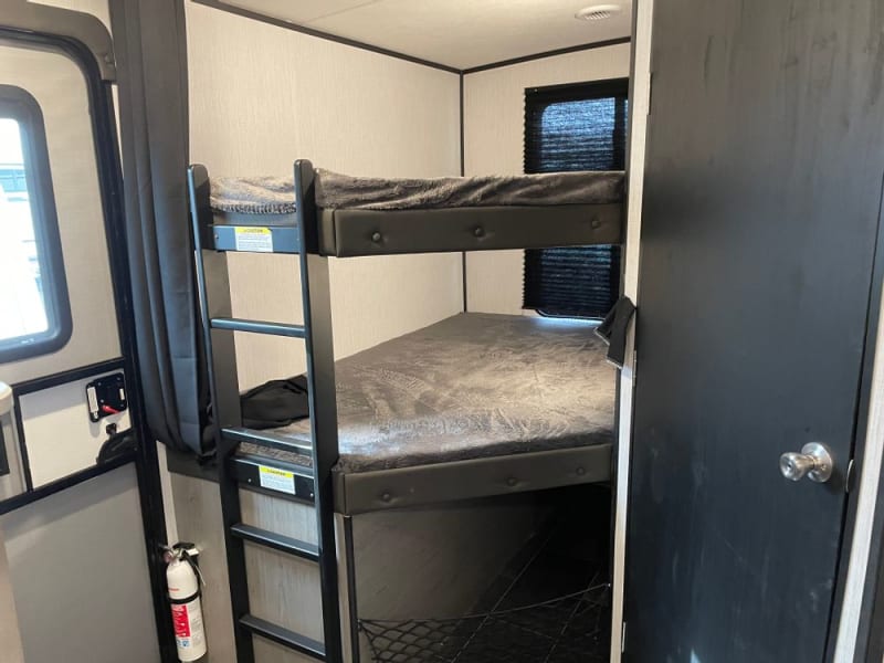 Double bunks. Top 200lb max and bottom 400lb max. Both have extra foam inserts to provide extra comfort. 