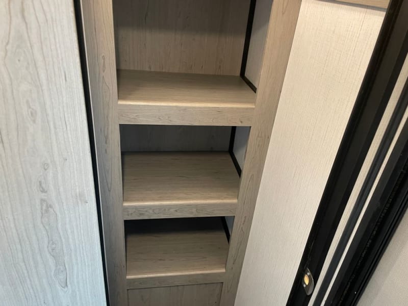 Walk in closet with lots of storage!