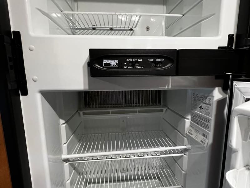 Large propane/Electric refrigerator and freezer. 