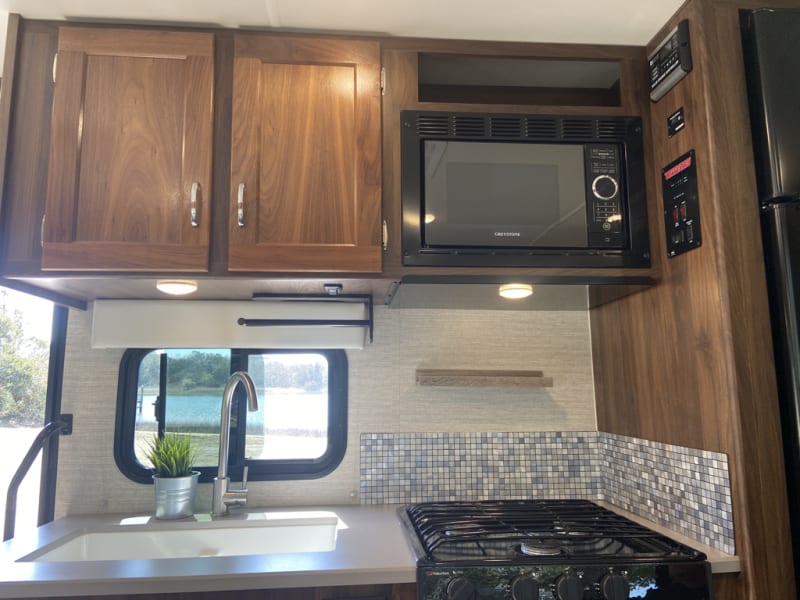 Full size microwave and gas cooktop