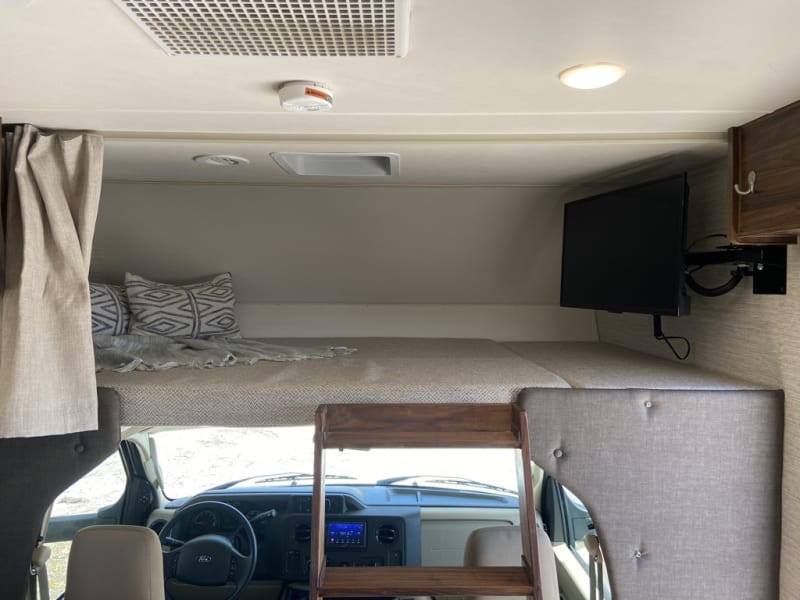 Large overhead sleeping area with a second television - perfect for children
