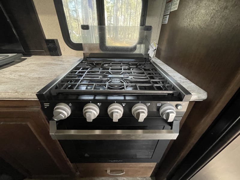 Three burner stove and oven for cooking multiple things simultaneously