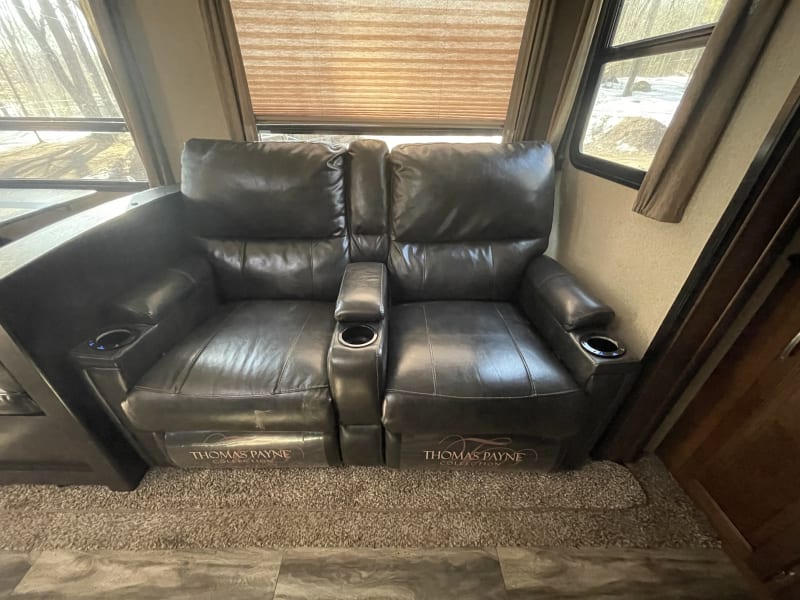 Dual leather recliners with heat and massage