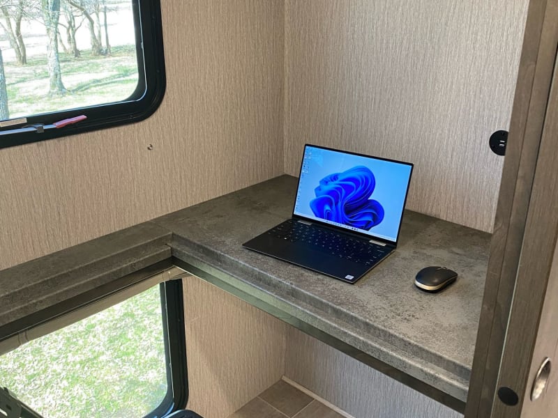 The bunk area can be converted into a traveling office.