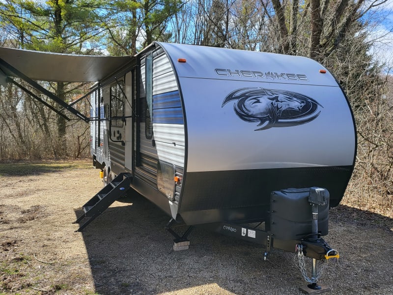 A 3/4 front view of the camper.