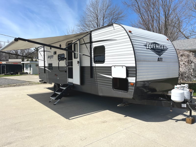 Outside view with Power Awning extended. 