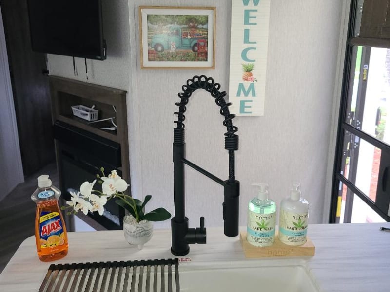 double sided sink, state of the art faucet