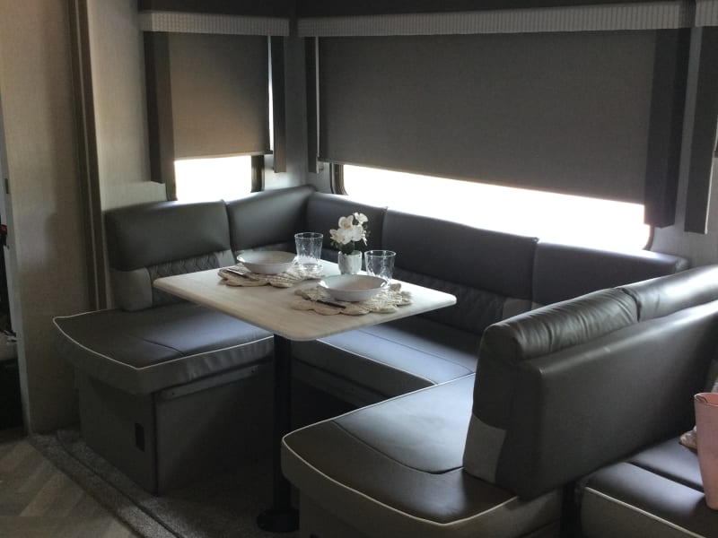 Dinette sits 4 comfortable, turns into a nice size bed at night. 