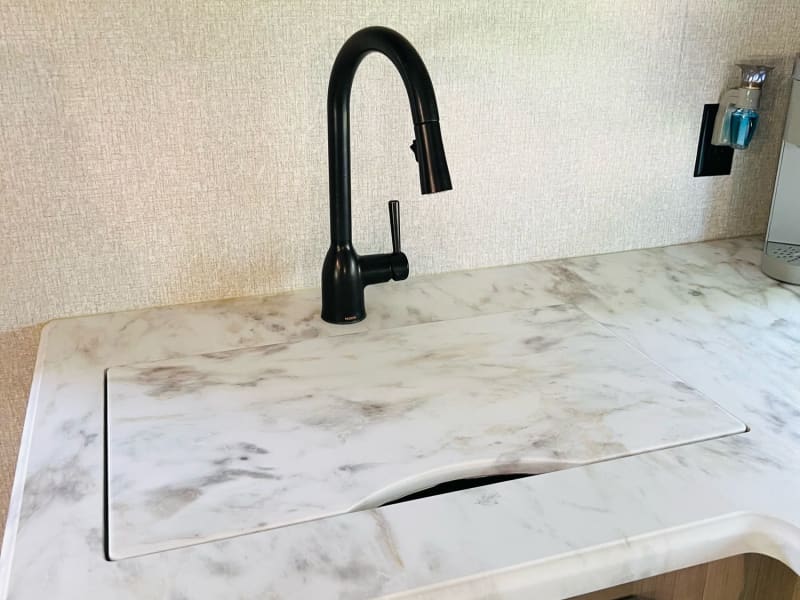 Sink cover to provide counter space