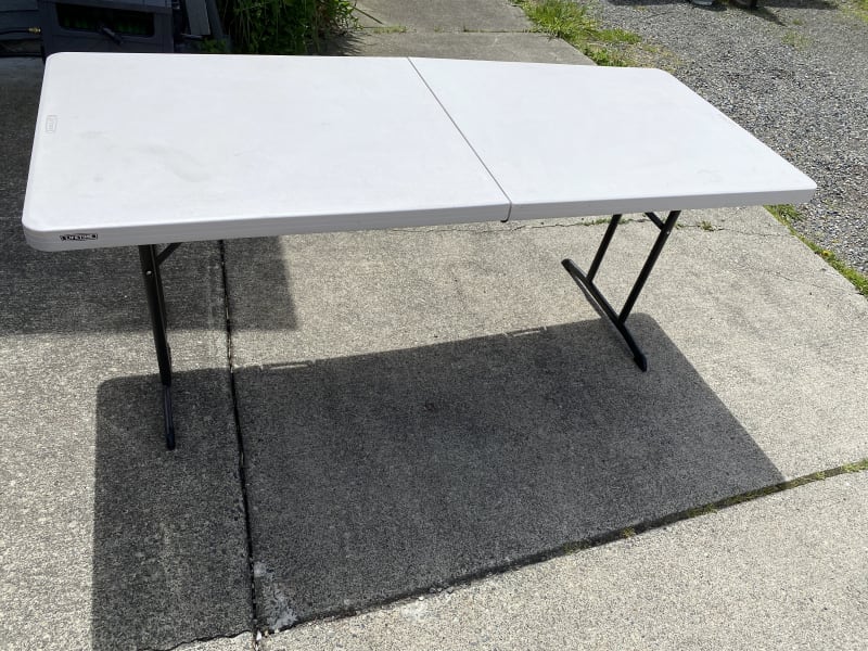 Folding six foot table provided.