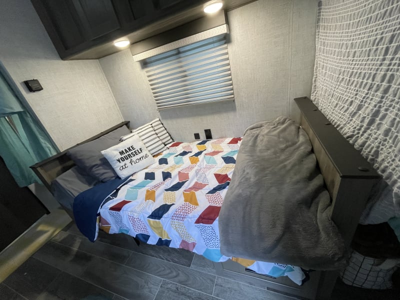 dinette converted into a bed.  its bigger than a twin, smaller than a full. cozy enough for two kids. :)  or a teen too cool for a bunk. 