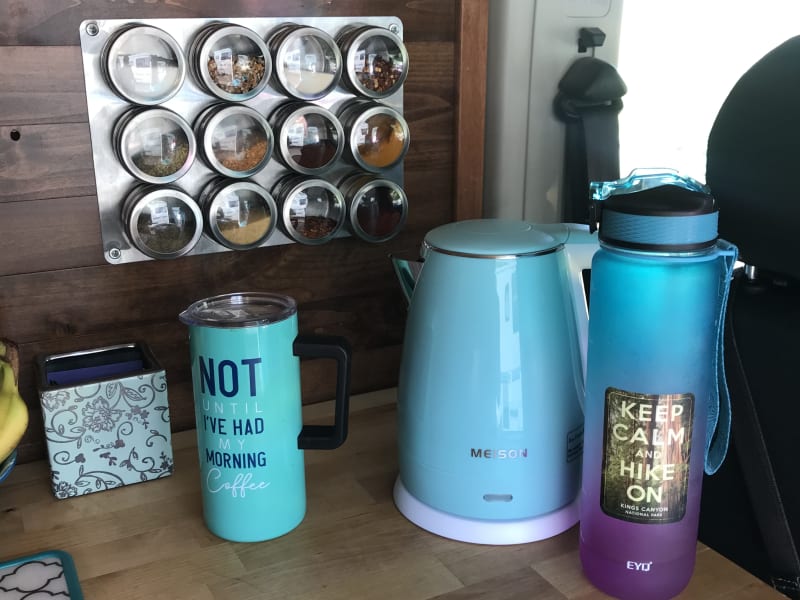 Tea kettle, counter and spice rack 