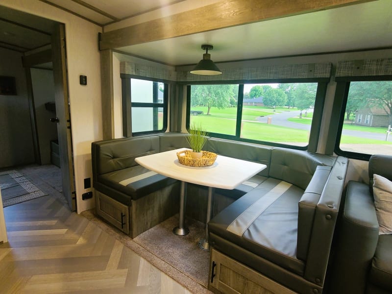 Dinette that turns into a sleeping area as well. 