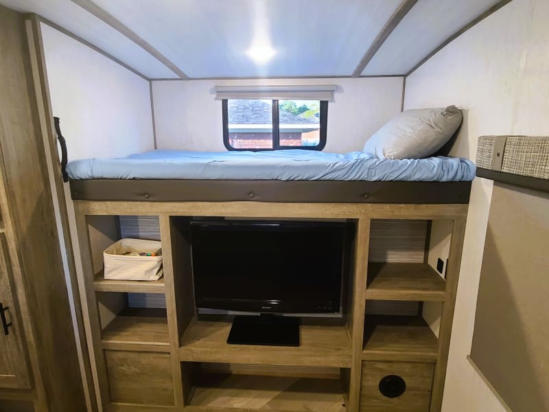 Plenty of extra storage and an entertainment center. 