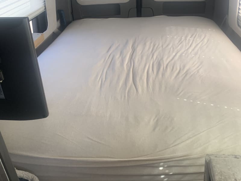 Queen foam/air bed that can be deflated for more passenger room.