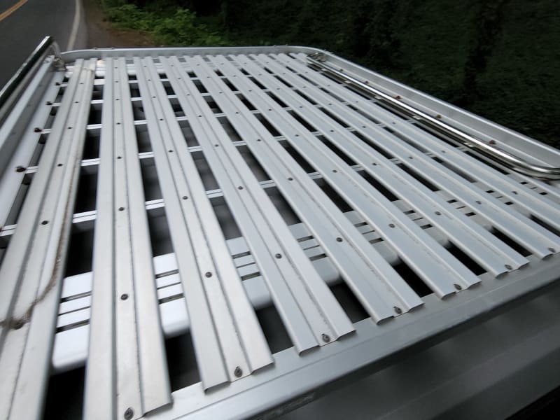 Luggage rack with folding side bars.