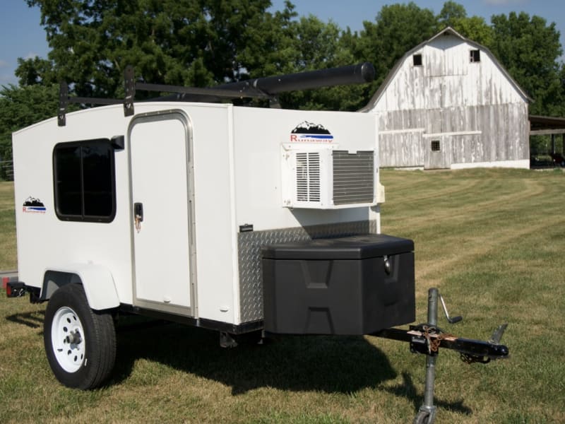 Front of the trailer. A/C unit waterproof & lockable tongue box.