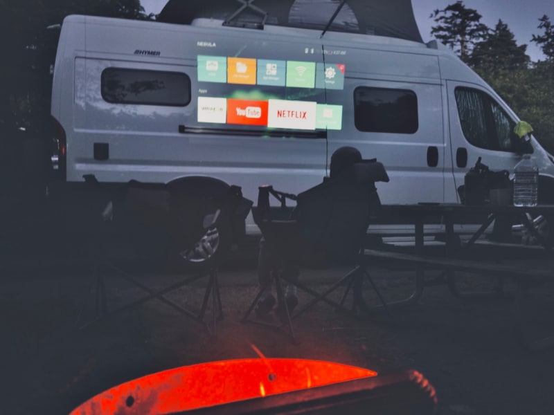 Our portable projector works great on the side of the van or inside the loft area ;) available as an add on