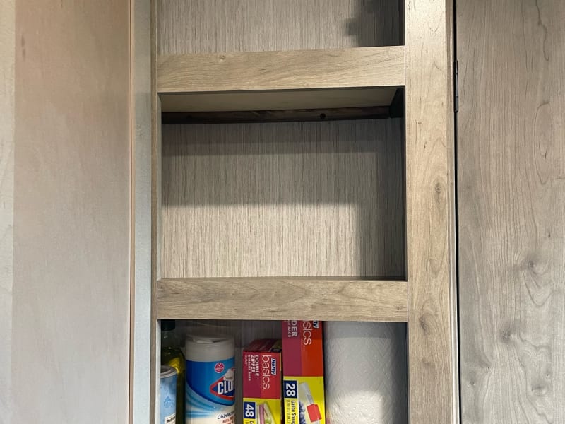 Plenty of storage in the pantry. Also included for your use: Smores sticks, food storage bags, cleaning supplies, and some basic spices and sugars. 