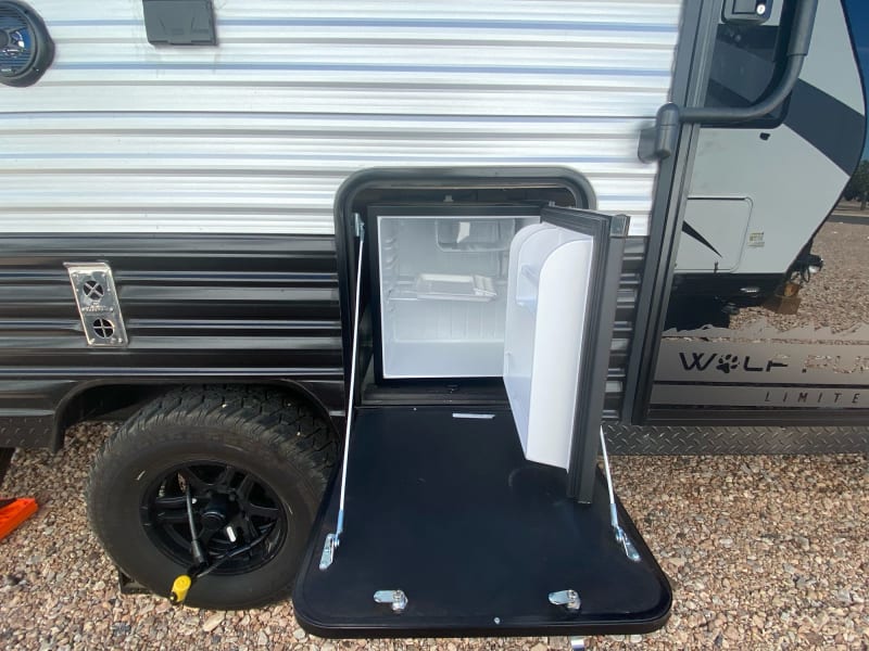 Why go inside to get a frosty beverage, this Pup had an outdoor fridge!