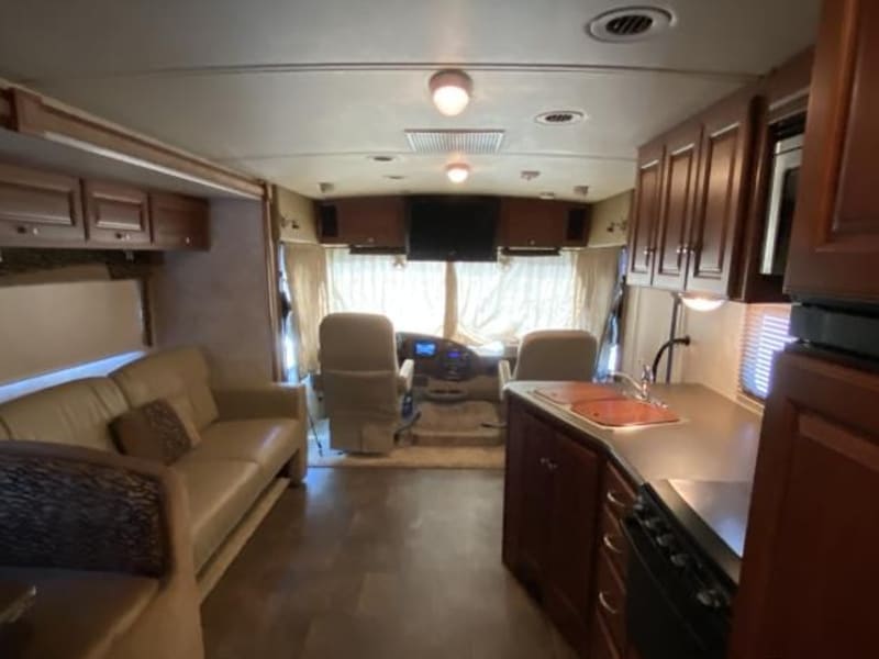 Living Room/Dining/Room Cockpit area with TV
Cockpit chairs swivel around to living room area and recline