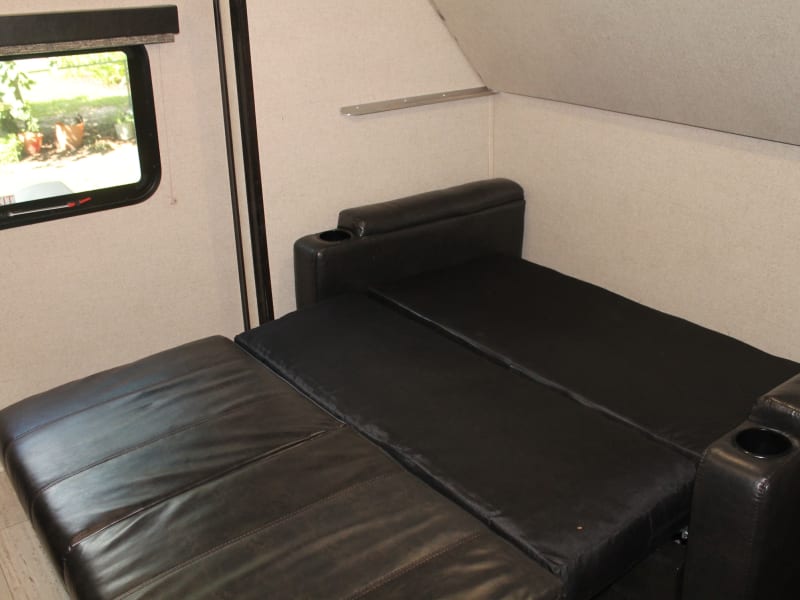 Bunkhouse love seat folded out to a full size bed