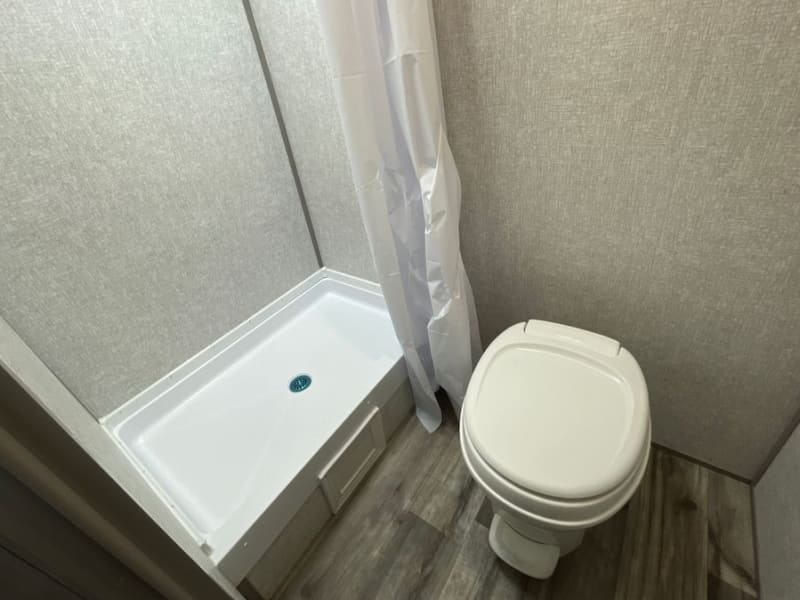 Bathroom area has everything needed to keep clean. RV friendly toilet paper is provided.