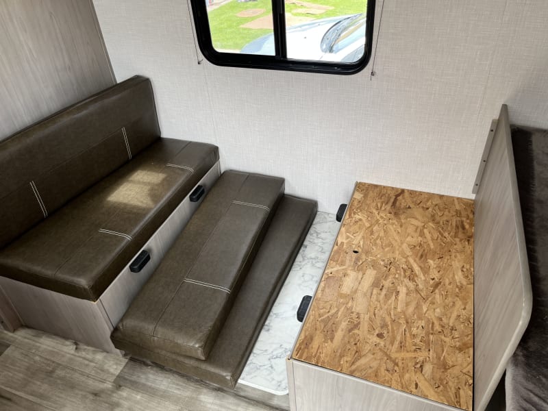 Keep the RV organized with hidden storage areas. 4 compartments like this are located throughout the trailer.