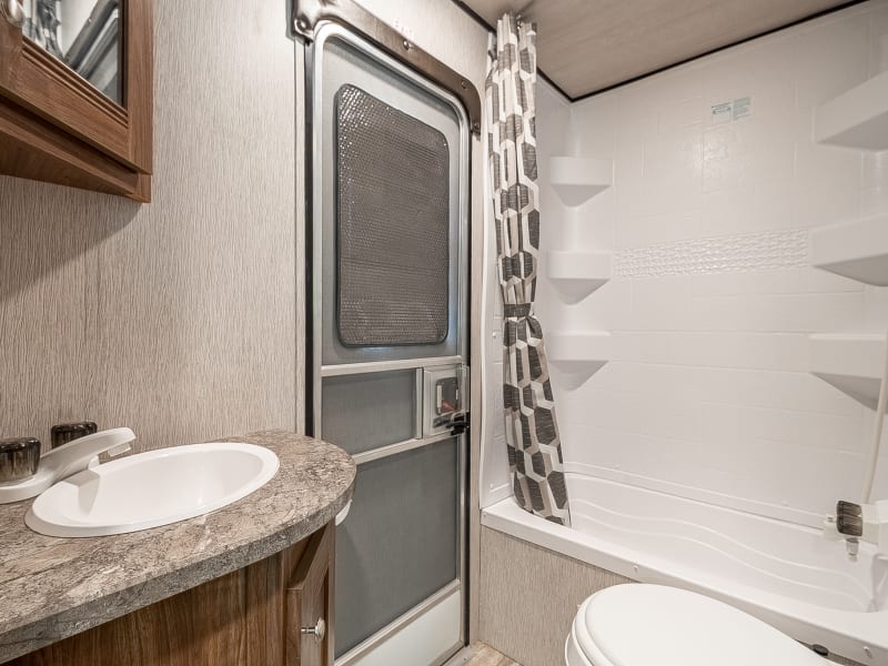 Bathroom with Shower Bath. Hot and Cold water.
