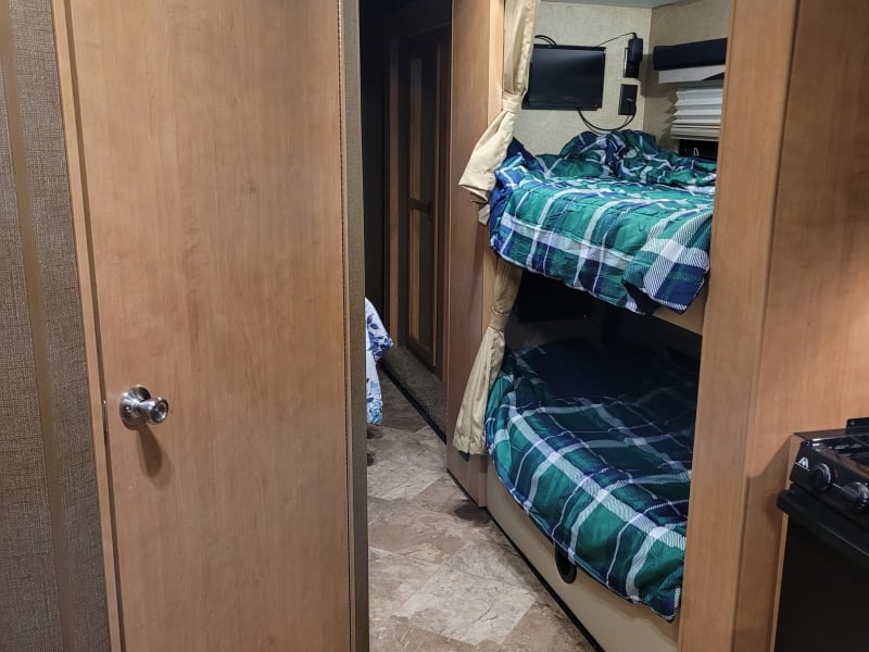 Two great bunk beds with personal TVs 