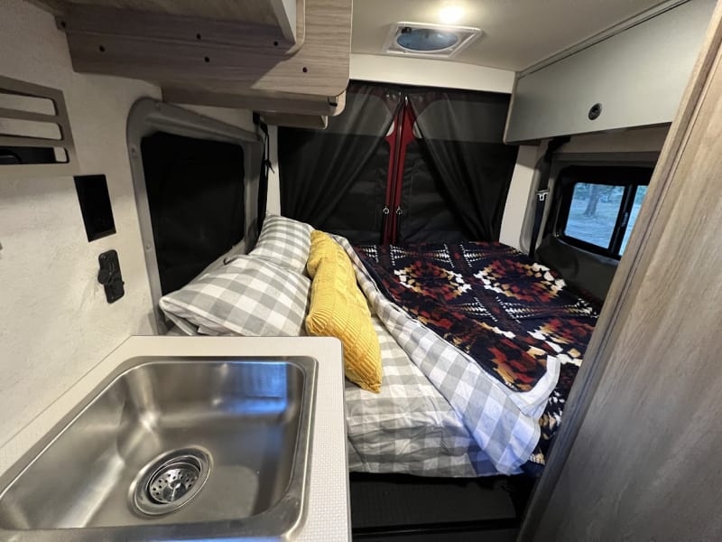 Second full bed in the rear of the van.