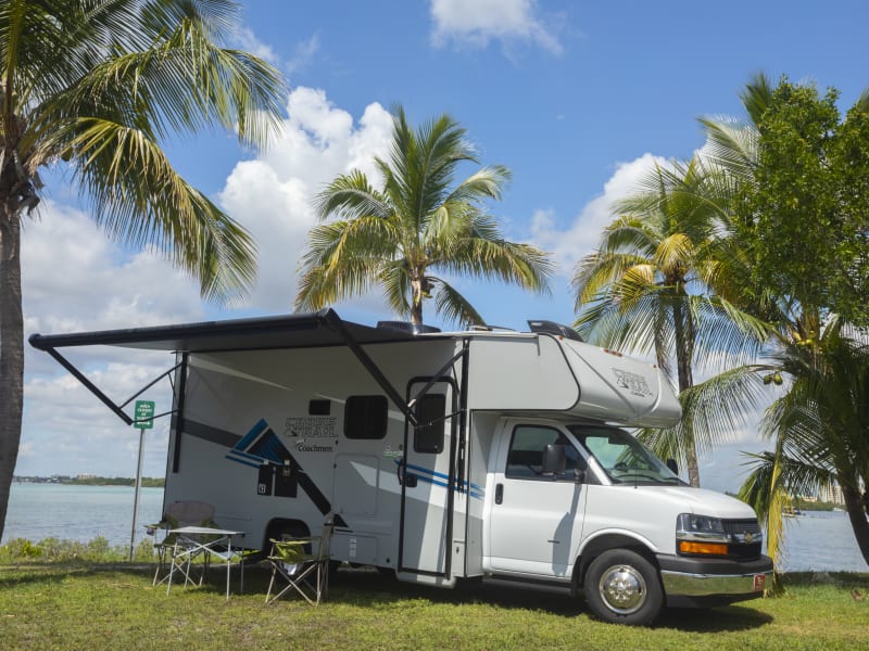 We provide foldable chairs and table when you want to enjoy the outdoors. This RV has a retractable owning that comes with LED light strips 