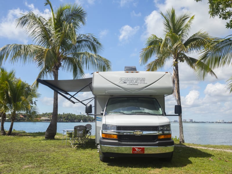 This RV has a retractable owning that comes with LED light strips and an outdoor entertainment center, so you can be in the wildlife and also have fun