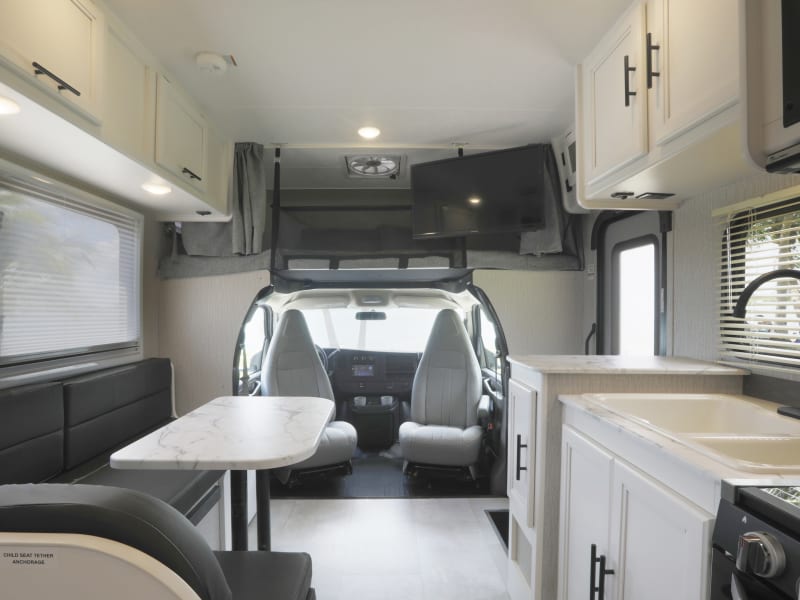 The swivel driver and passenger seats will have you feeling so comfortable, you might go to doze off. Along with the U-shaped dining room