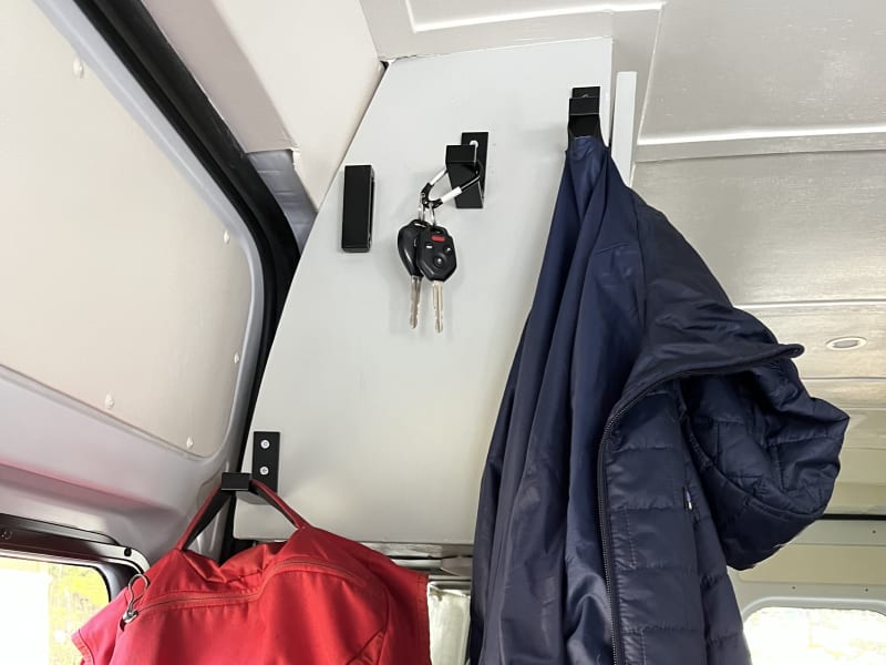 Foldable hooks for jackets and backpacks
