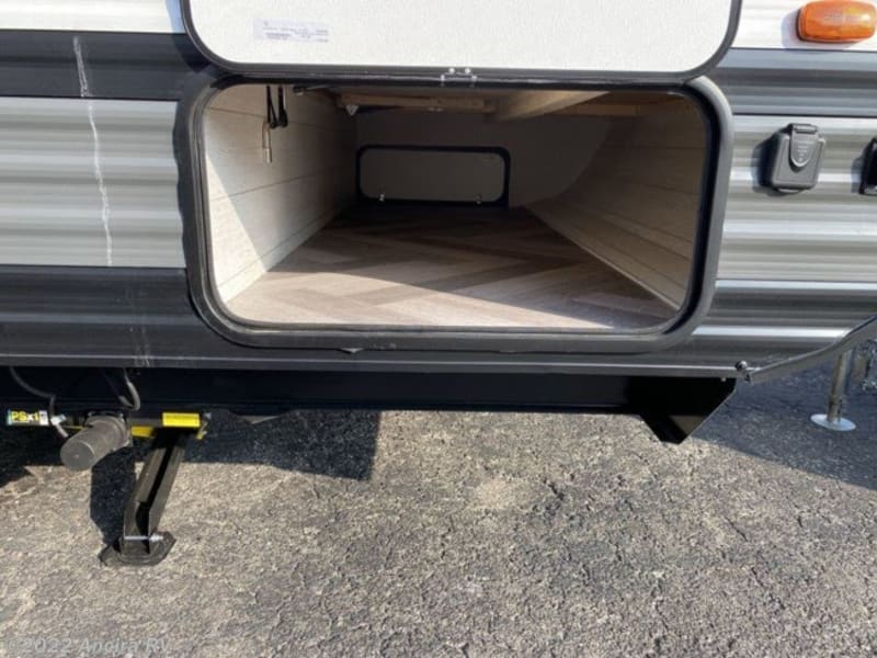 Pass through storage. This can also be accessed by lifting the master bed mattress