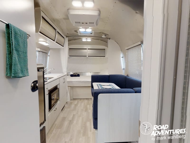 View of galley, sofa & main bed