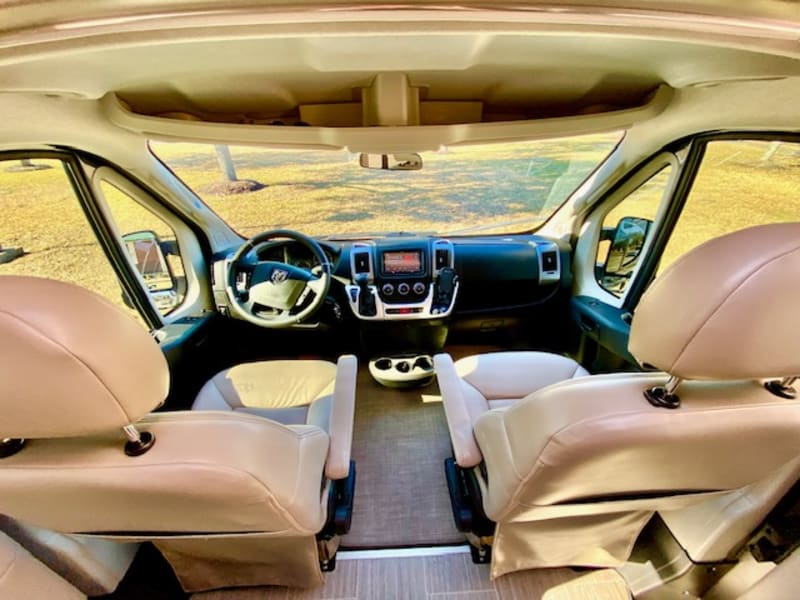 Cushy but supportive captains chairs are your friend for your long road trips.  Front and side windows are tinted to help keep you comfortable.
 
