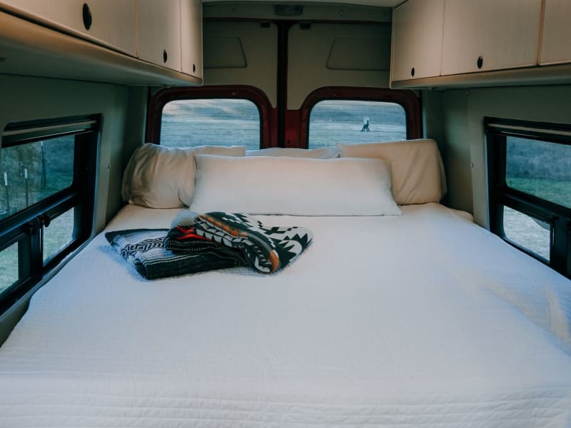 Put the pillows that are stored behind the cushions above the extensions. They have Velcro on each side 