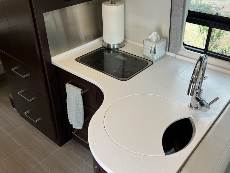 2 burner gas range and large sink with cutting board!