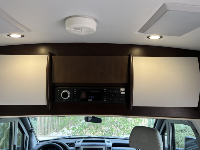 Stereo system sounds great - 4 speakers in rear.
