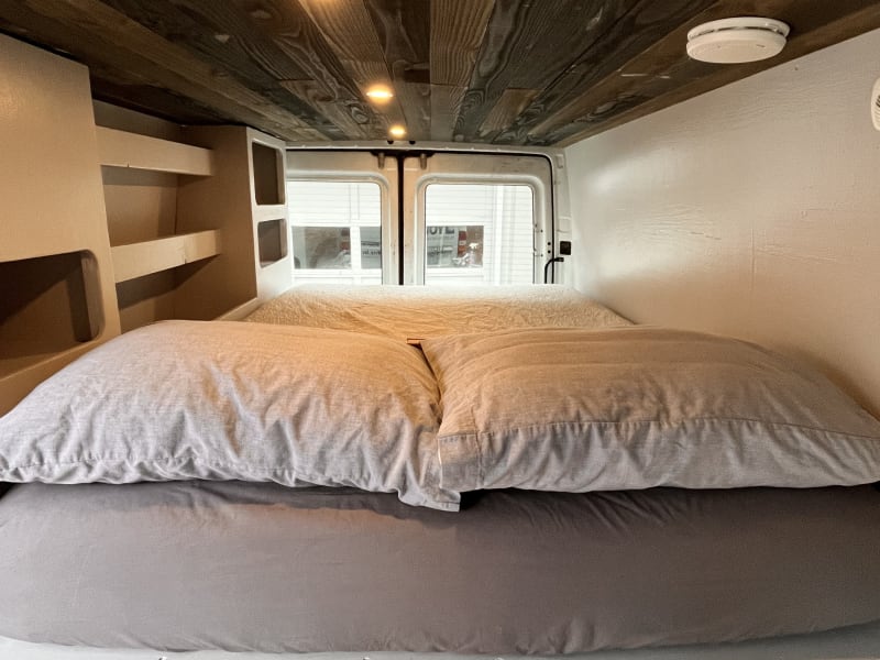 Choose to sleep with your head at the front or back of the van. Whatever's easiest and comfiest! 