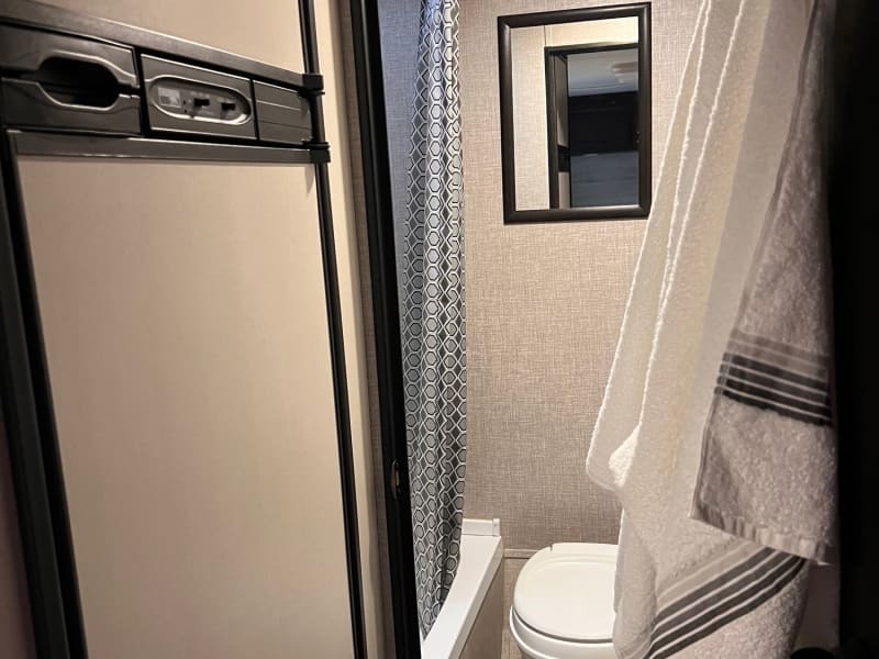 Roomy bathroom with two skylights. Towels are included in rental. 